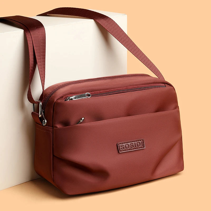 Sac Bandoulière Femme en Nylon Imperméable – Double Compartiment et Multiples Poches Zippées