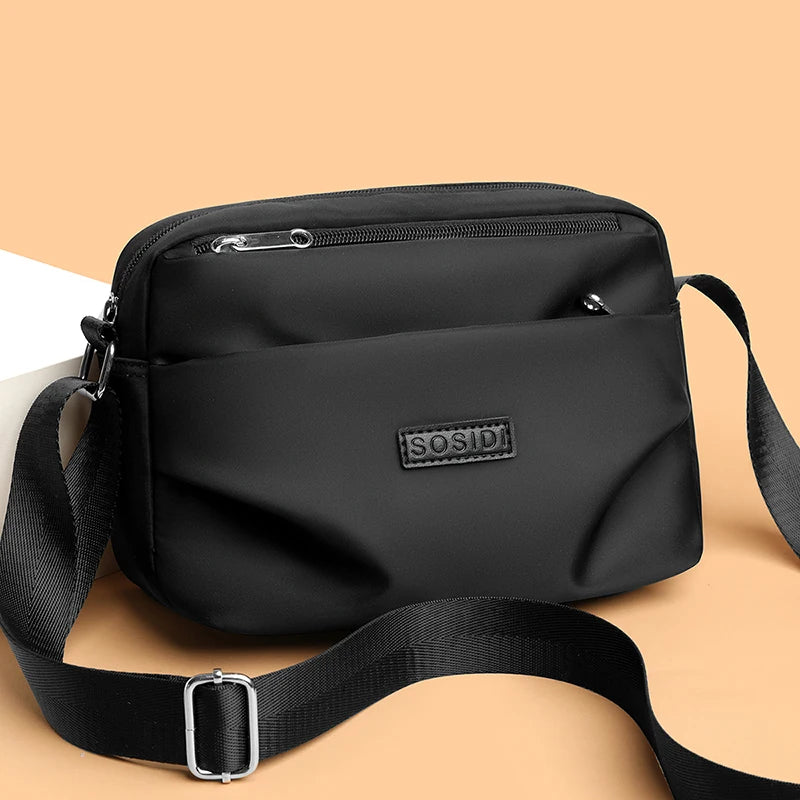 Sac Bandoulière Femme en Nylon Imperméable – Double Compartiment et Multiples Poches Zippées