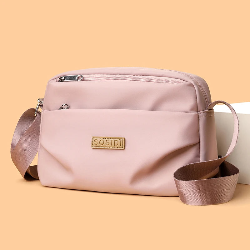 Sac Bandoulière Femme en Nylon Imperméable – Double Compartiment et Multiples Poches Zippées
