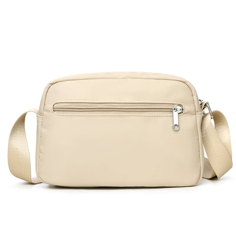 Sac Bandoulière Femme en Nylon Imperméable – Double Compartiment et Multiples Poches Zippées